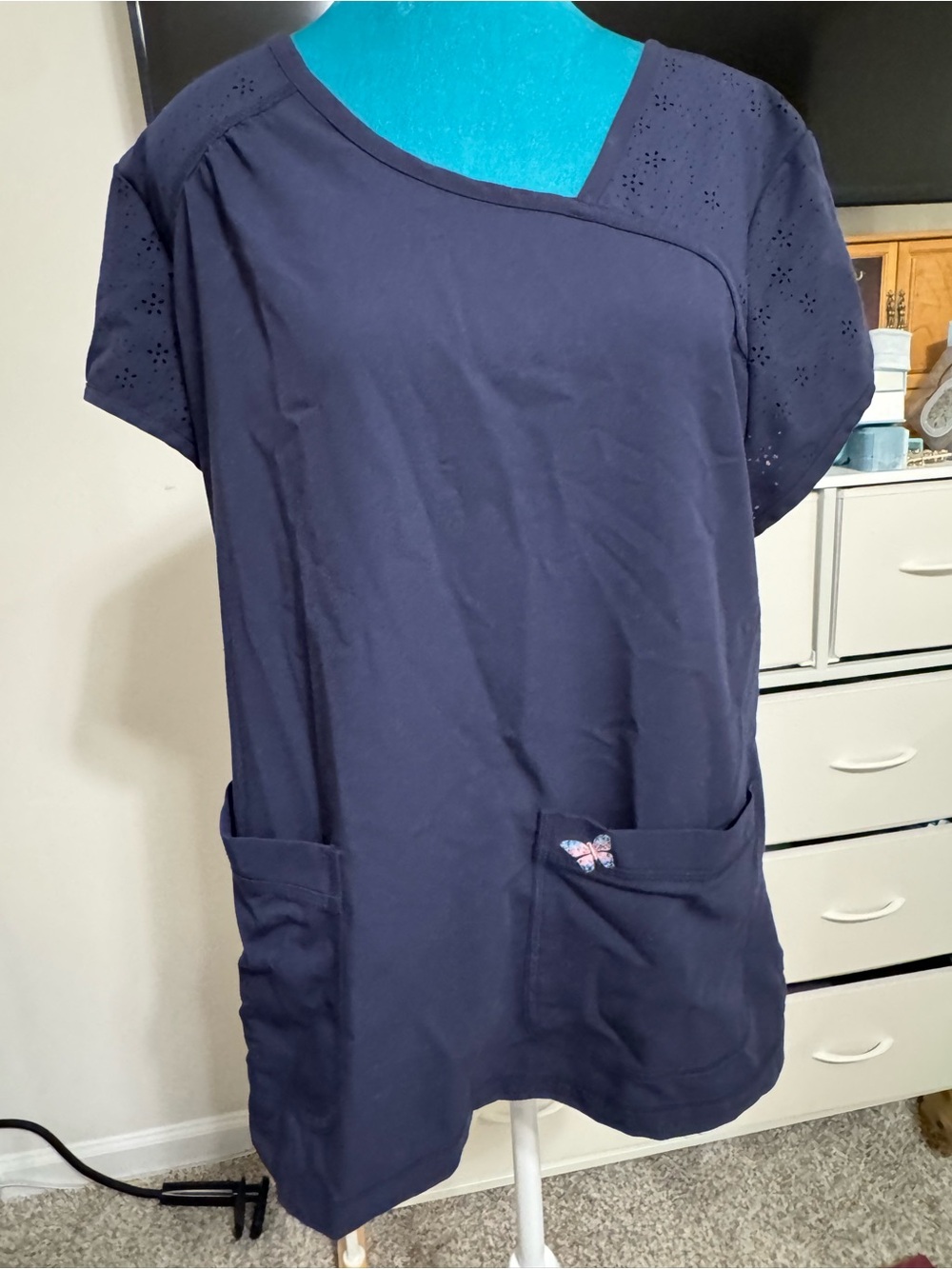 Mariposa by koi Navy Blue Scrub Top with Eyelet Sleeves and Front Pockets